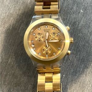 Swatch Gold Tone Chronograph Bracelet Watch and a silver one